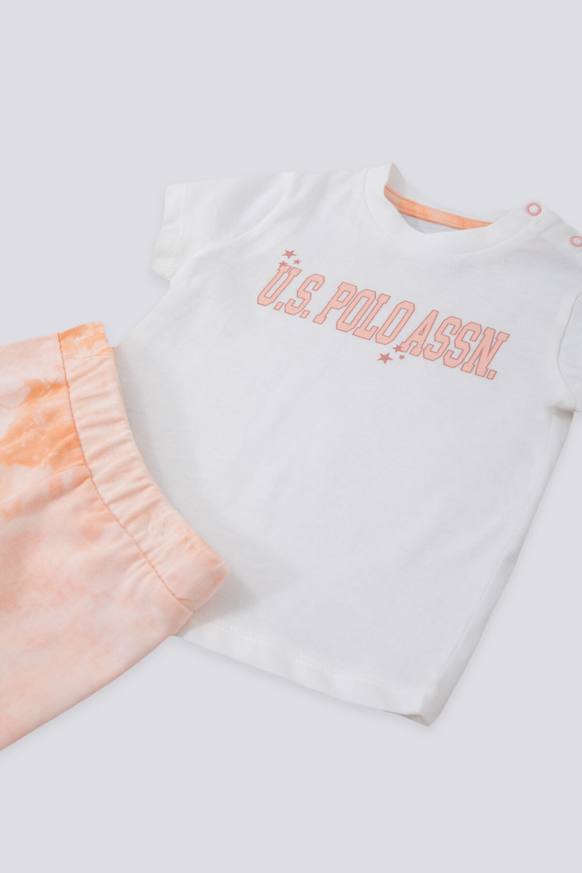 ست تیشرت و شلوارک نوزادی U.S. Polo Assn مدل Piquant Cream Salmon — 4